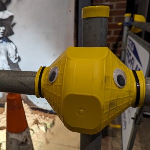 Picture of an eyebombed scaffolding guard at an art exhibion